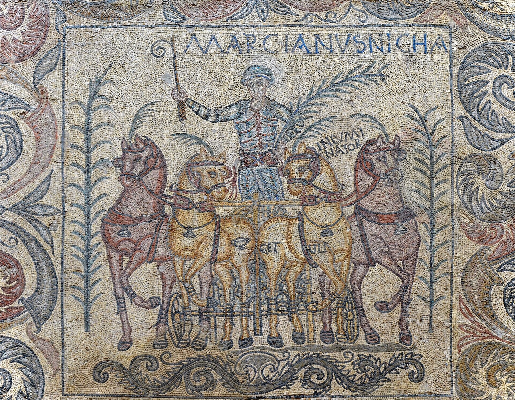 Ancient Roman mosaic from Mérida depicting a charioteer competing in a dramatic circus race