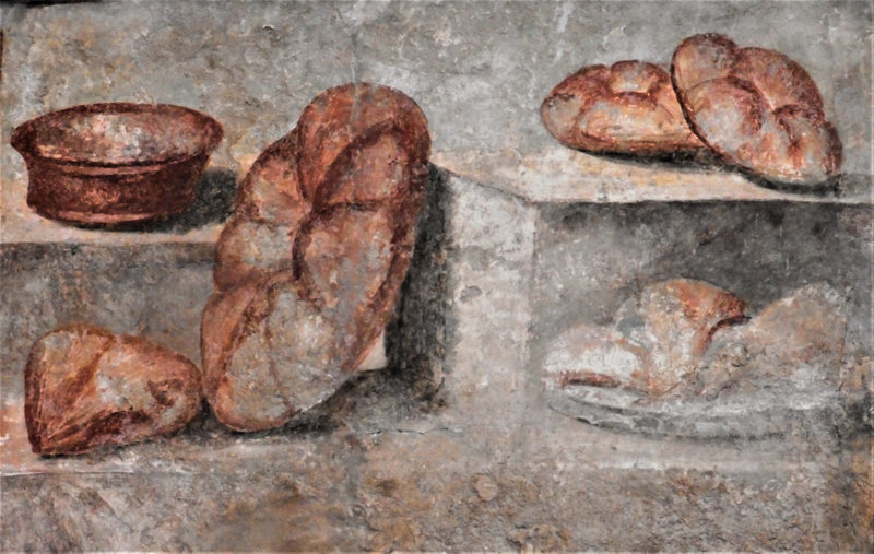 Traditional Roman bread displayed as an example of ancient Roman staple food