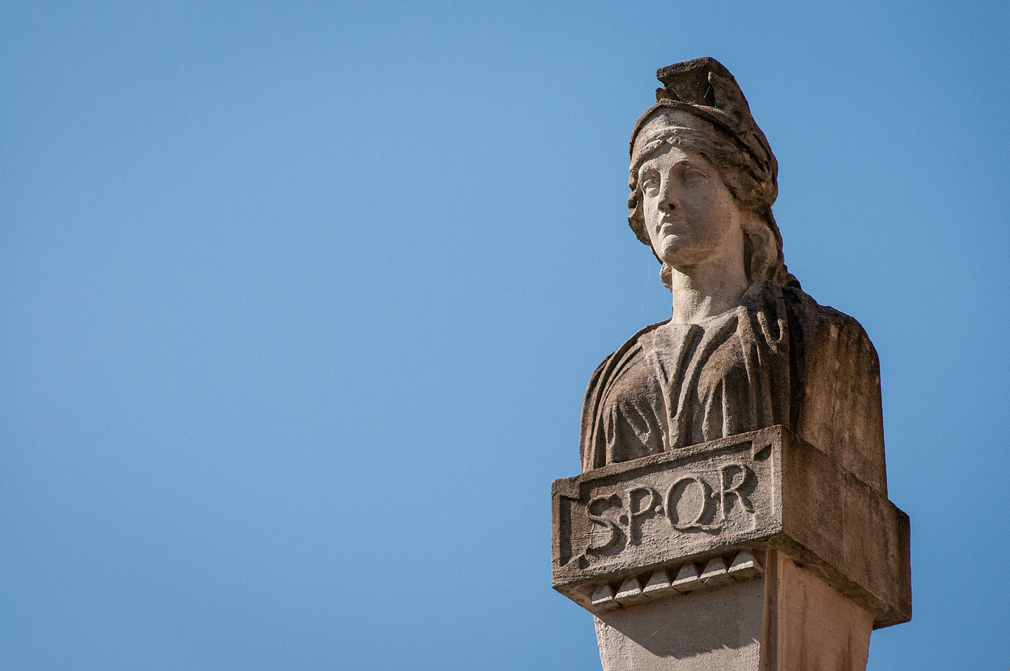 Roman statue featuring SPQR, the famous abbreviation representing the Roman state and people